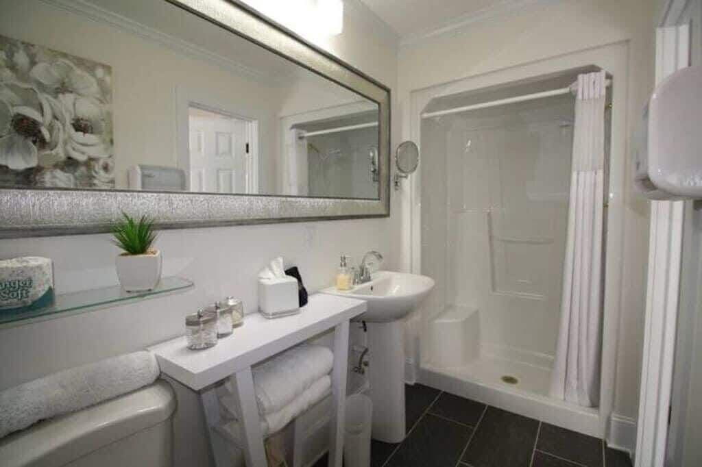 Upstairs Bathroom - Right Off Of The Kitchenette - Sink, Shower, Toilet.