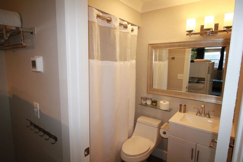 Rose Cottage - Upstairs Bathroom - Sink, Shower/Bath, Toilet.