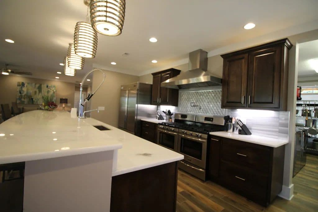 10 burners, commercial hood, double commercial fridge, 2 microwaves, and 2 d/w's