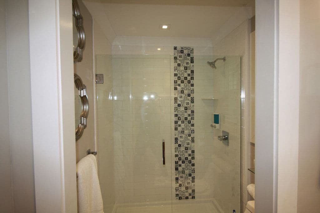 Oversized Glass Shower. Body Wash, Shampoo And Conditioner Provided