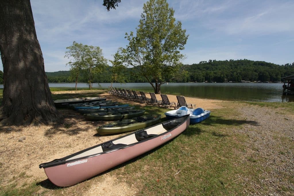 Beach Area  Six Kayaks, Jon Boat, Paddle Boat, & A Canoe (Common Area).