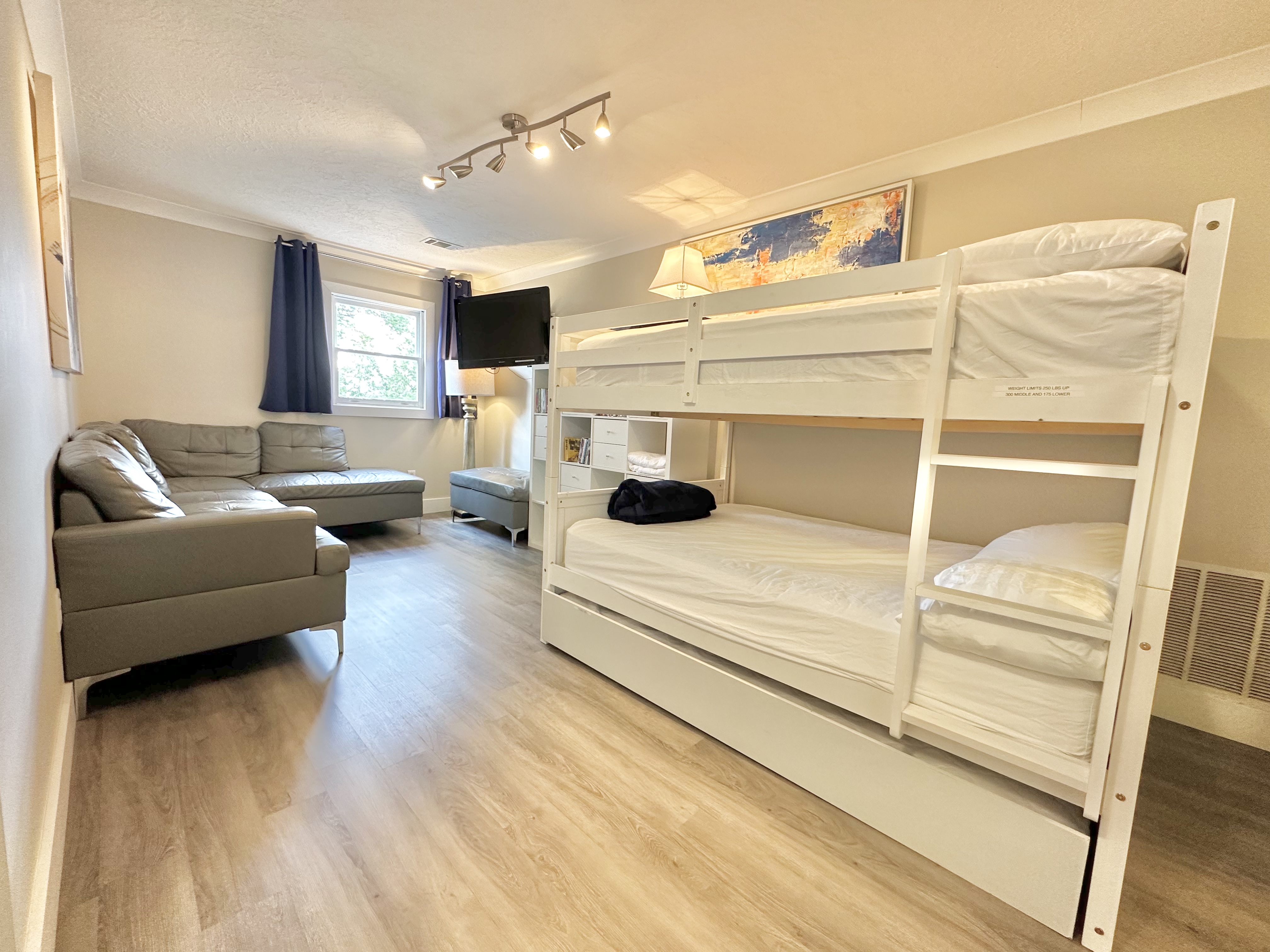 The Loft (Sleeps 5). Double bunk bed with twin trundle underneath.