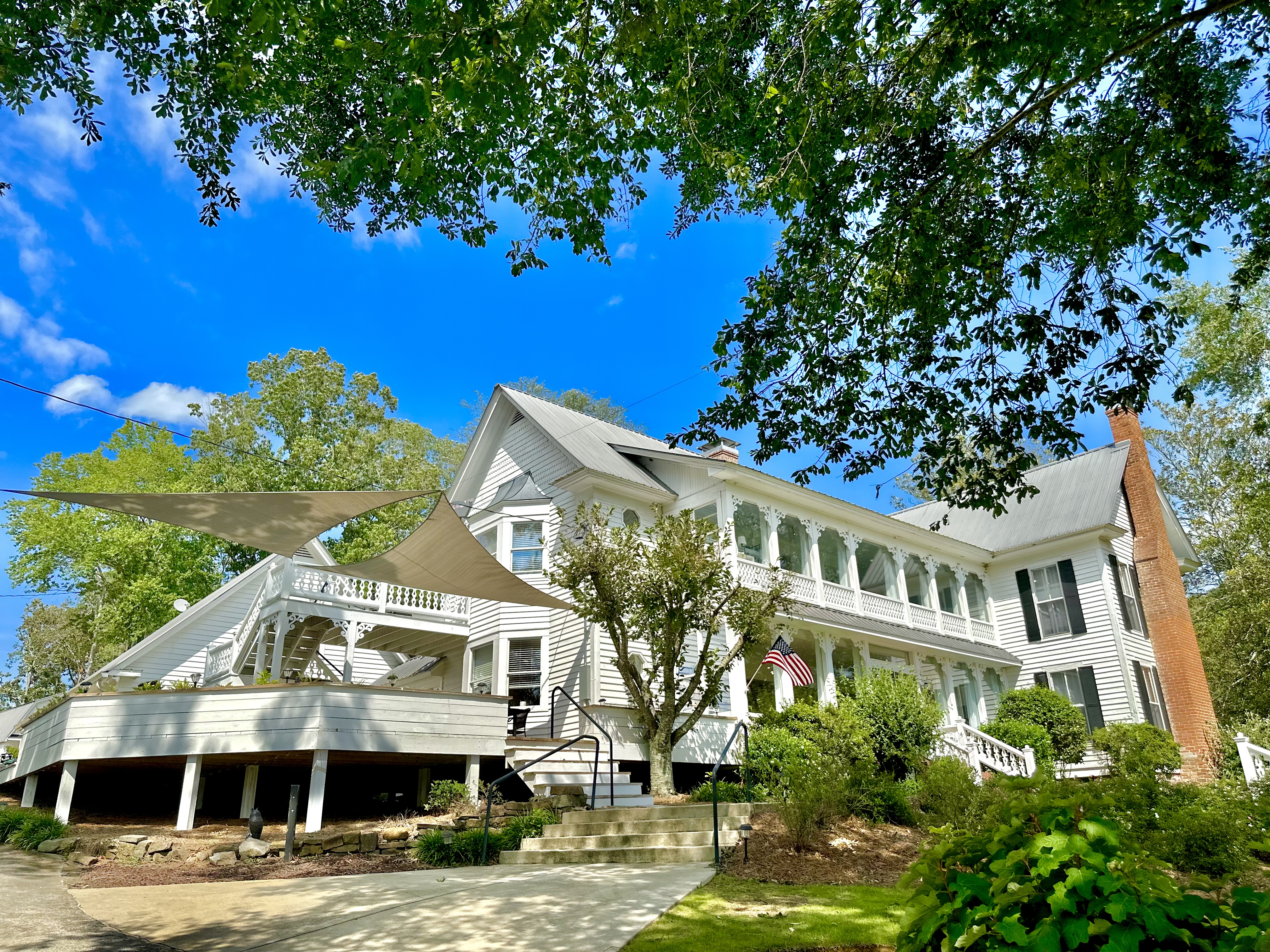 Front view of the house and side deck.