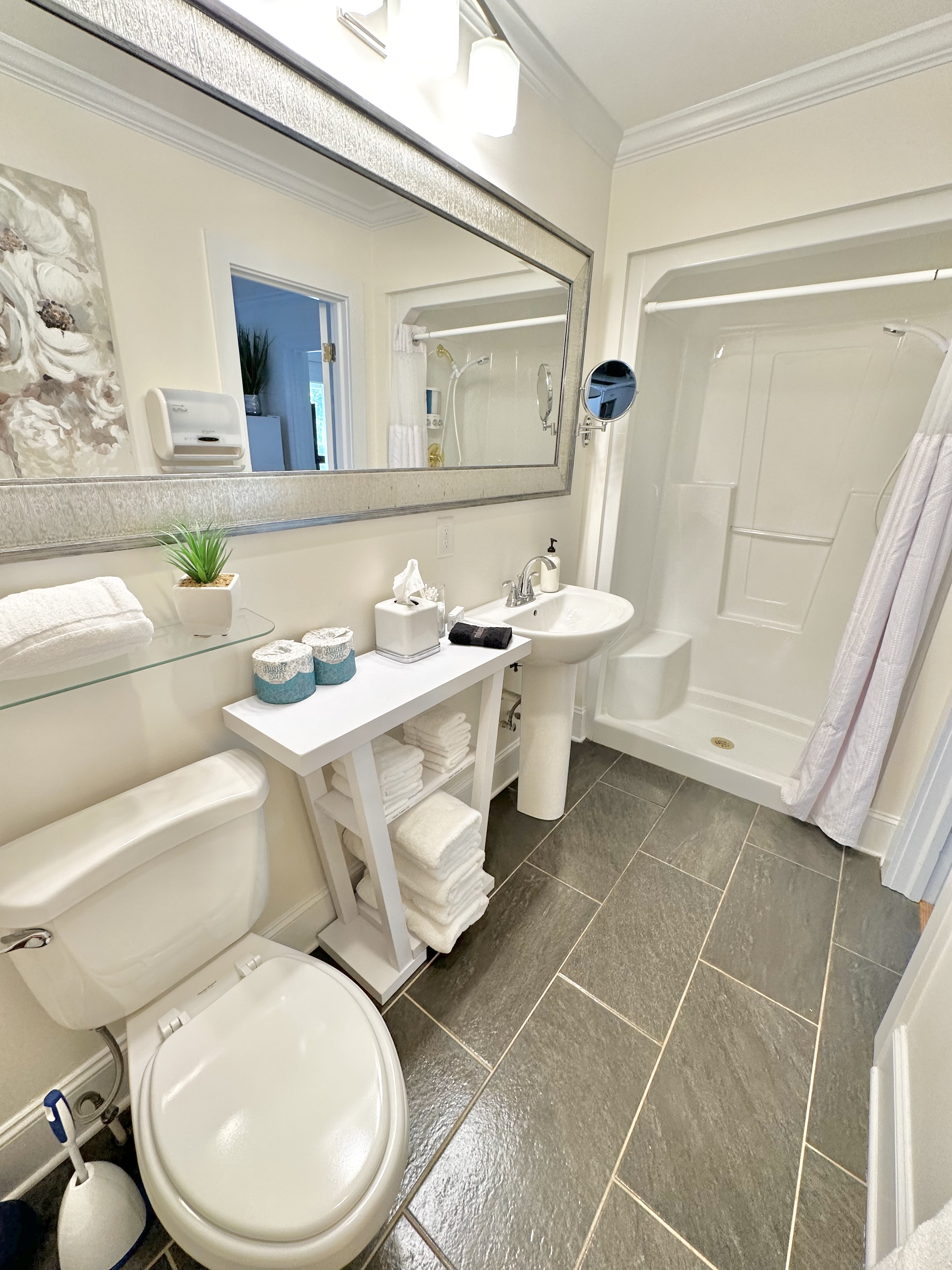 Magnolia Suite Bath-Upper Level. Shampoo, conditioner, & body wash are provided. This is right off of the double queen room & upstairs kitchenette.