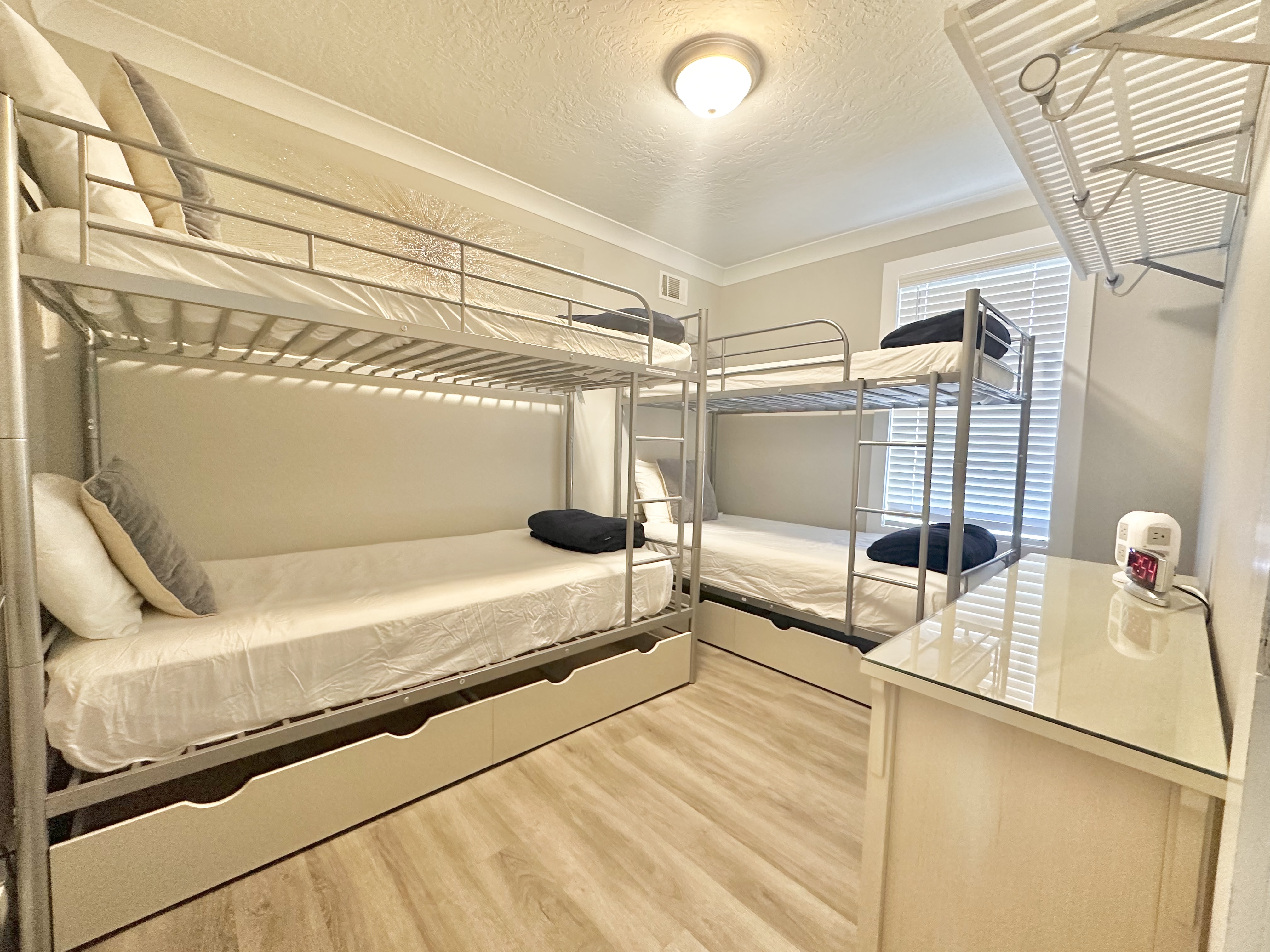 Rose Twin Room - Main Level (Sleeps 4). Two twin bunk beds.
