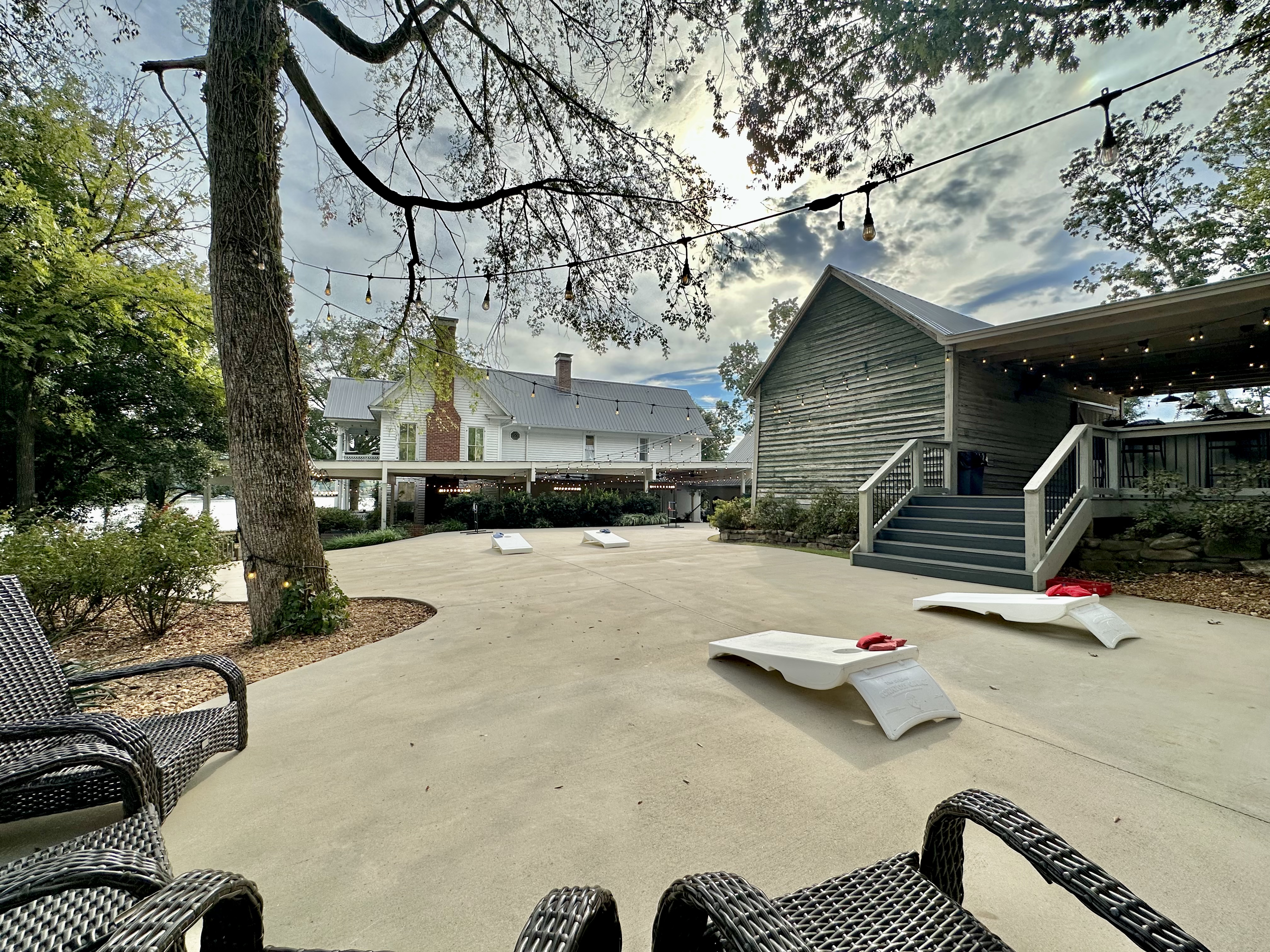The top tier patio looking toward the house. Corn Hole, Ladder Ball, and plenty of room to spread out!