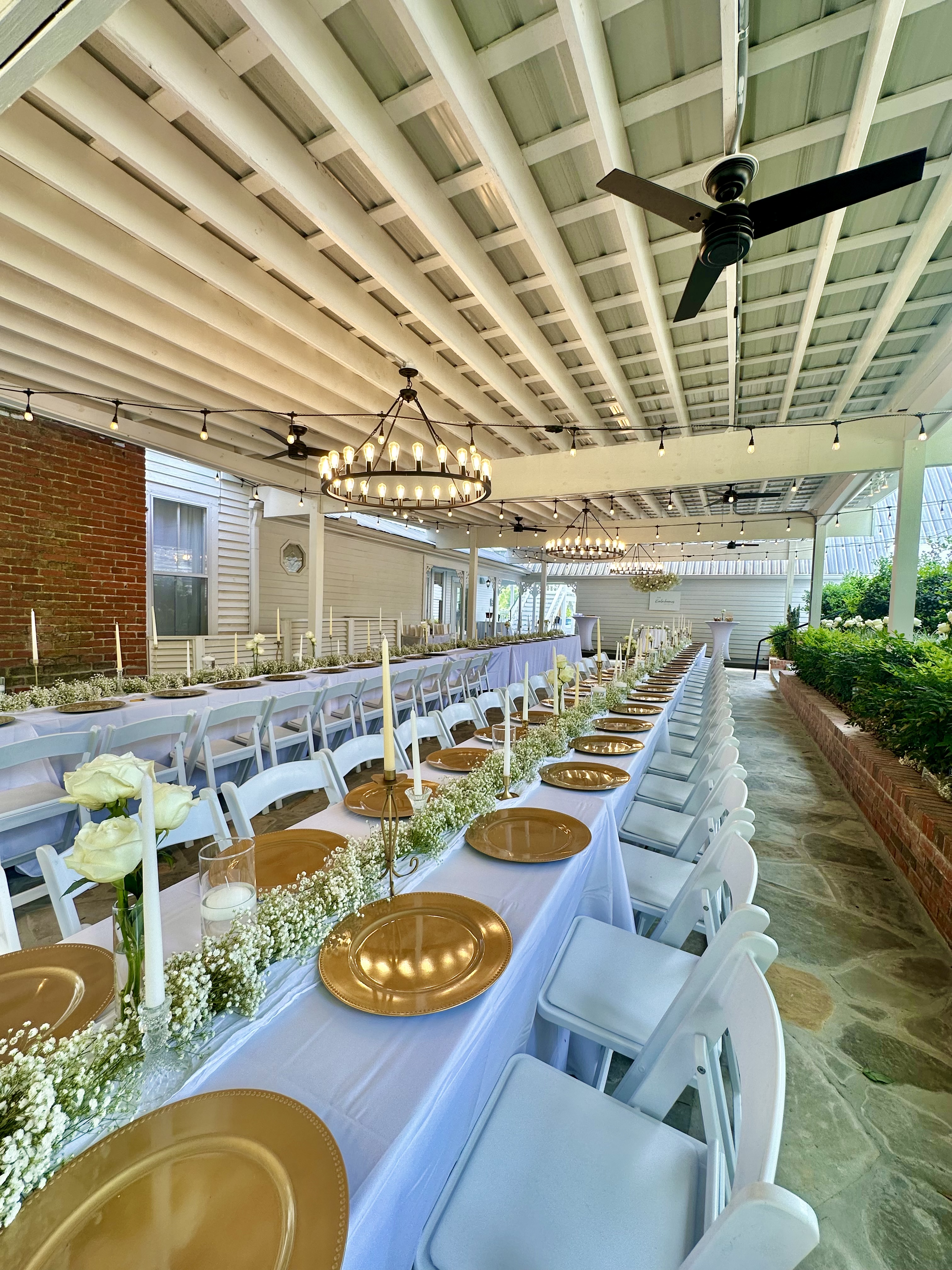 Reception area for weddings. The gorgeous chandeliers and  luxurious stone patio make fore a magical night!