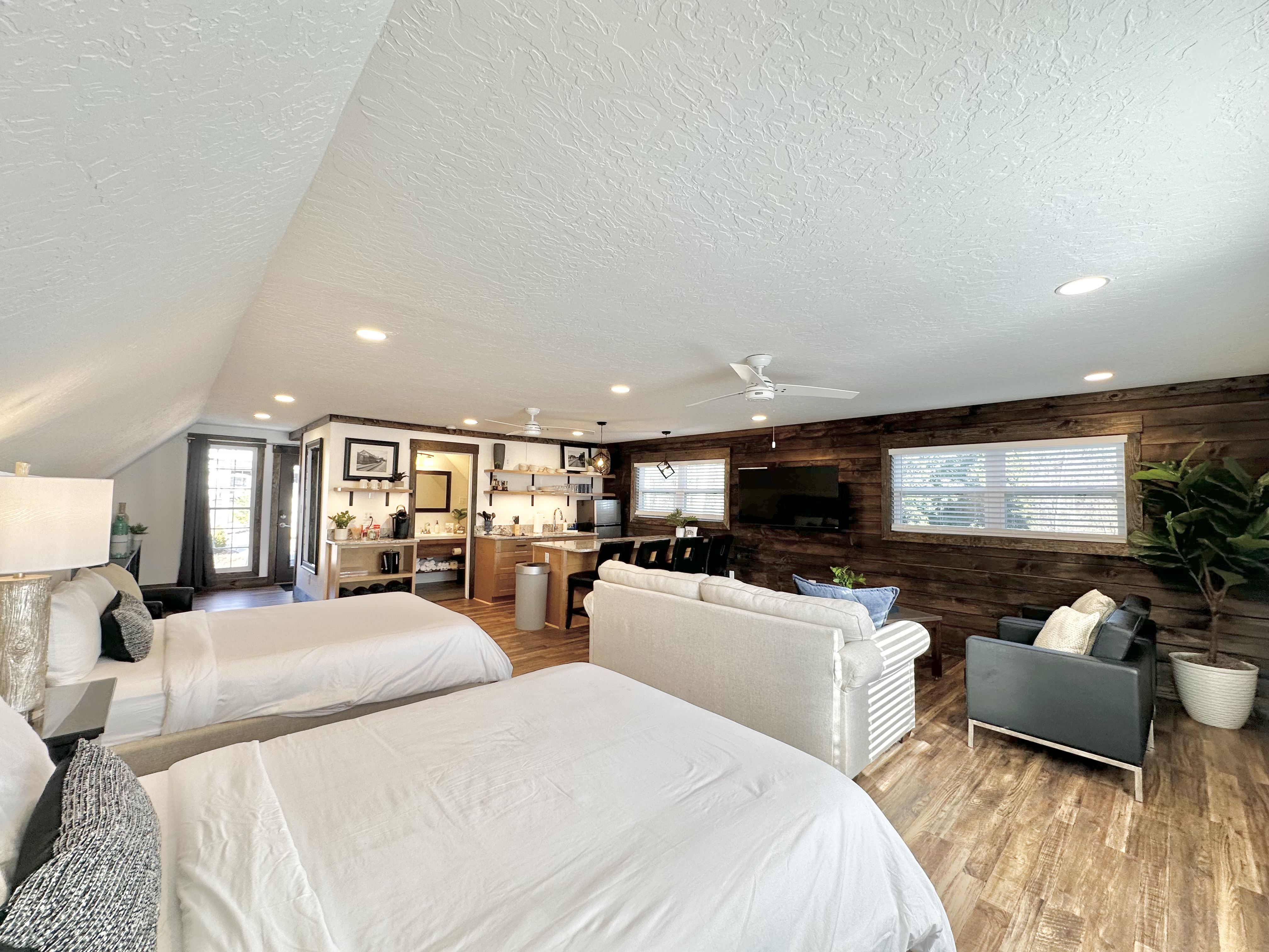 The “Den” - 2 Queen sleeper sofa & Queen sleeper sofa. Full bathroom shower/tub combo + Kitchenette